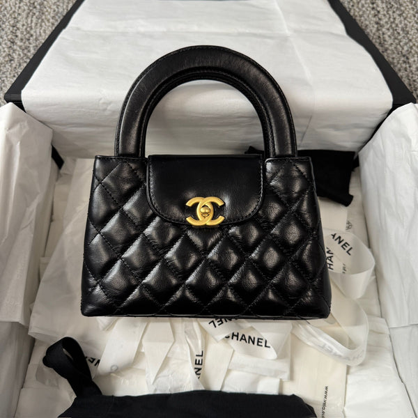 CHANEL Shiny Aged Calfskin Quilted Nano Kelly Shopper Black