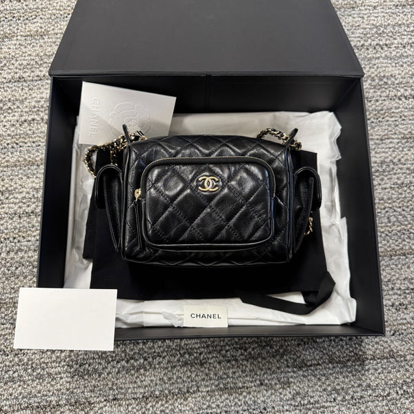 Chanel Quilted Calfskin Small Black Camera Bag With Gold-Tone Hardware Chain Strap & Multiple Pockets. Luxury Design With Iconic CC Logo
